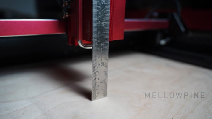 Measuring the distance of the laser head from the table