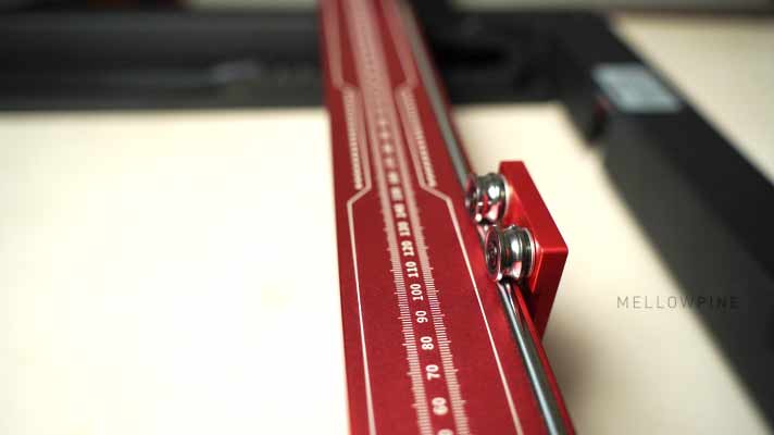 Steel rail and rollers on the X-axis