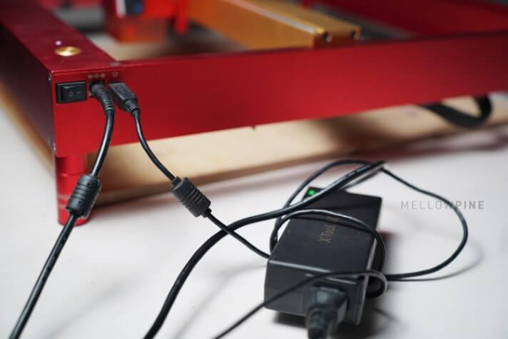 USB cable tangled with the power cable
