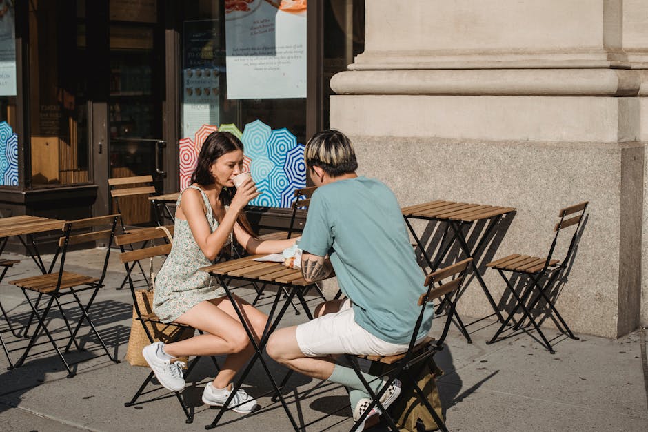 Couple calmly discussing over coffee