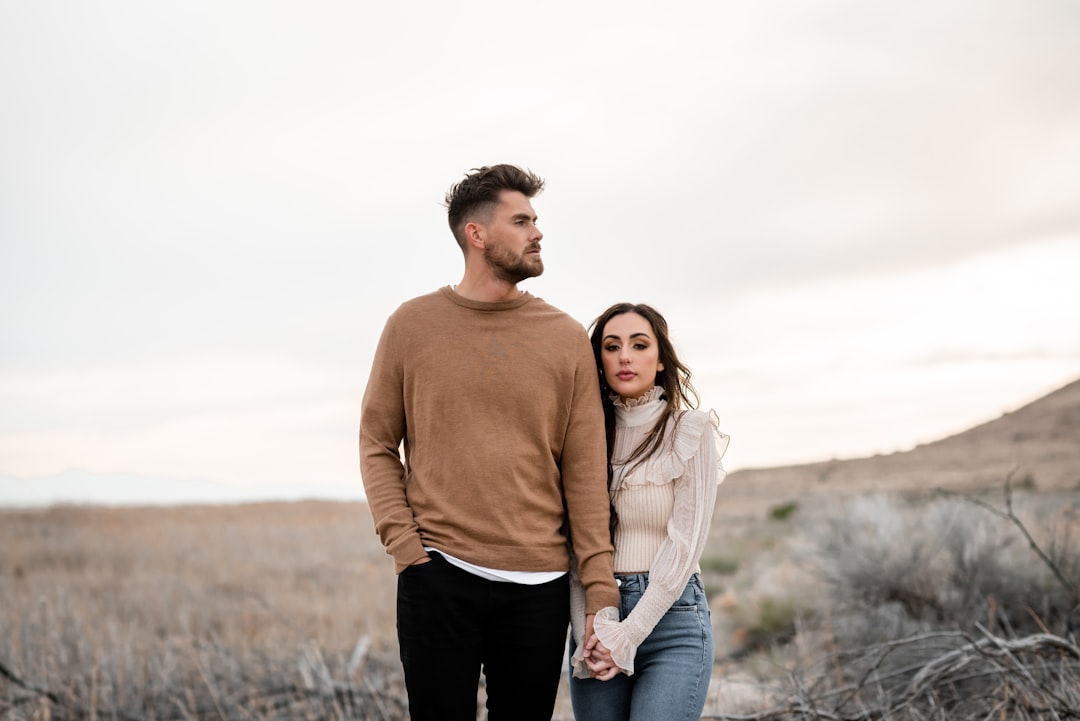 Couple holding hands on a date