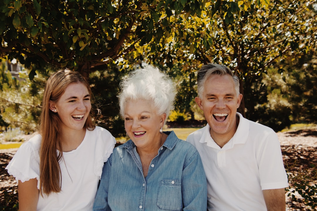 Smiling grandparents with family