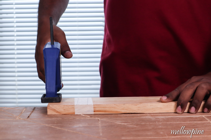 clamping the wood on the work table